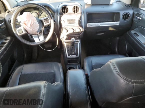 2016 Jeep Compass Latitude with VIN 1C4NJCEB7GD704858, listed as a Copart auction lot 42990065 with 79,380 mi miles and Salvage Title. Bid and sale history available at carsss.com. Image 8.