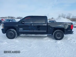 2015 Chevrolet Silverado 1500 High Country with VIN 3GCUKTEC0FG148198, listed as a IAAI auction lot 41493933 with 164,453 mi miles and . Bid and sale history available at DreamBid. Image 14.