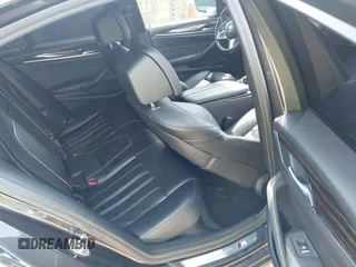 2018 BMW 5 Series 540i z VIN WBAJE5C50JWA96205, wystawiony jako IAAI lot #42213253 z przebiegiem 96 198 mil mil oraz . Historia ofert i sprzedaży dostępna na DreamBid. Obrazek 8.