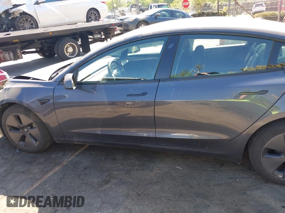 2023 Tesla Model 3 with VIN 5YJ3E1EA6PF645110, listed as a IAAI auction lot 42044357 with 24,352 mi miles and . Bid and sale history available at DreamBid. Image 14.