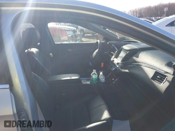 2014 Chevrolet Impala LT with VIN 1G1115SL1EU112255, listed as a IAAI auction lot 41753176 with 69,583 mi miles and . Bid and sale history available at DreamBid. Image 5.