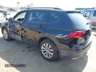 2018 Volkswagen Tiguan S with VIN 3VV1B7AX7JM092033, listed as a IAAI auction lot 42373619 with 124,775 mi miles and . Bid and sale history available at DreamBid. Image 3.