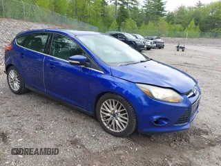 2014 Ford Focus Titanium with VIN 1FADP3N26EL243171, listed as a IAAI auction lot 42285437 with 70,848 mi miles and . Bid and sale history available at DreamBid. Image 1.