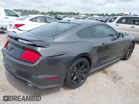 2019 Ford Mustang EcoBoost with VIN 1FA6P8TH6K5106082, listed as a IAAI auction lot 42466881 with 105,323 mi miles and . Bid and sale history available at DreamBid. Image 4.