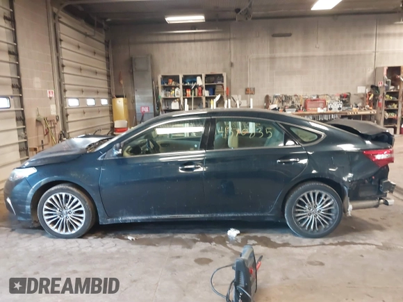 2016 Toyota Avalon Limited with VIN 4T1BK1EB3GU236479, listed as a IAAI auction lot 41370835 with 404,864 mi miles and . Bid and sale history available at carsss.com. Image 14.