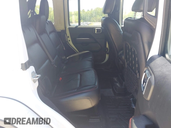 2021 Jeep Wrangler Unlimited Rubicon with VIN 1C4HJXFG5MW586842, listed as a IAAI auction lot 42186683 with 76,450 mi miles and . Bid and sale history available at DreamBid. Image 8.