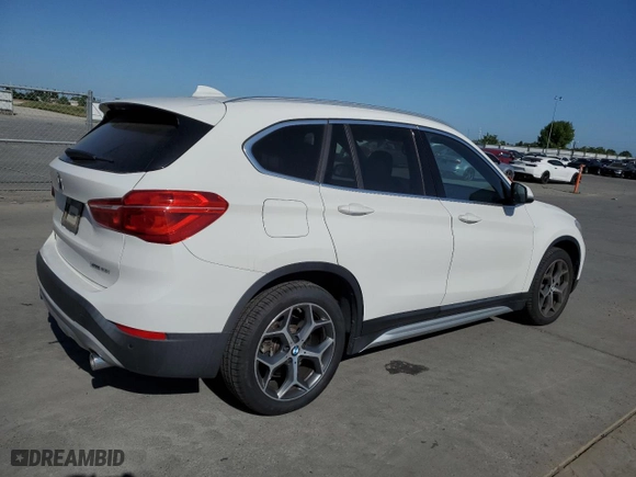 2019 BMW X1 xDrive28i with VIN WBXHT3C53K5L35670, listed as a Copart auction lot 53493245 with 14,201 mi miles and Salvage Title. Bid and sale history available at carsss.com. Image 3.