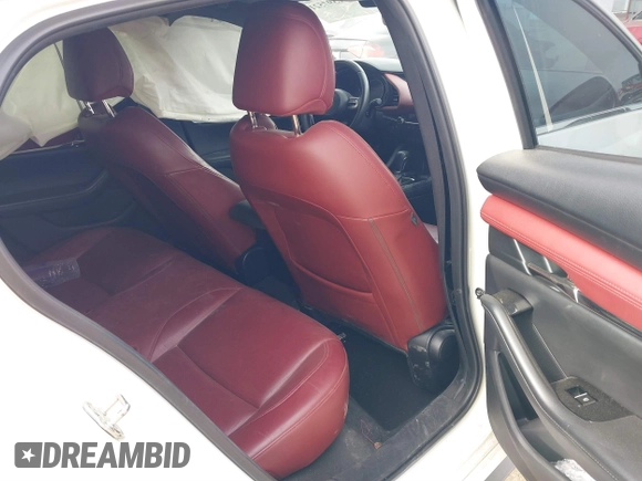 2021 Mazda 3 Premium with VIN JM1BPAML0M1302385, listed as a IAAI auction lot 41397521 with 55,907 mi miles and . Bid and sale history available at DreamBid. Image 8.