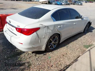 2017 Infiniti Q50 Premium with VIN JN1EV7AR5HM839081, listed as a IAAI auction lot 42663515 with 73,870 mi miles and . Bid and sale history available at DreamBid. Image 4.