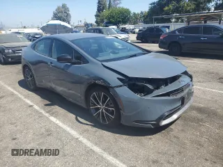 2024 Toyota Prius LE with VIN JTDACAAU2R3017834, listed as a Copart auction lot 64457785 with 22,465 mi miles and Salvage title. Bid and sale history available at DreamBid. Image 4.