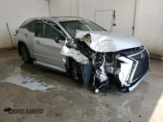2016 Lexus RX 350 with VIN 2T2BZMCA1GC032722, listed as a Copart auction lot 59550625 with 124,611 mi miles and Salvage title. Bid and sale history available at DreamBid. Image 4.