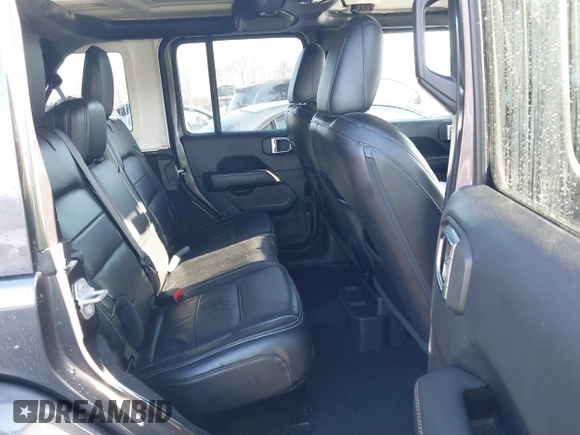 2018 Jeep Wrangler Unlimited Sahara with VIN 1C4HJXEN5JW203879, listed as a IAAI auction lot 41131467 with 87,065 mi miles and . Bid and sale history available at DreamBid. Image 8.
