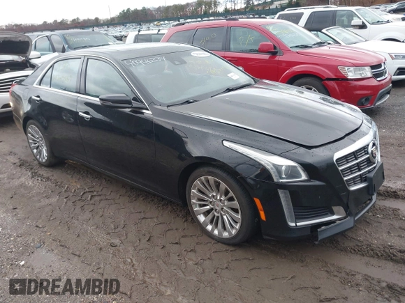 2014 Cadillac CTS Luxury AWD with VIN 1G6AX5SX9E0195923, listed as a IAAI auction lot 40946334 with Not Provided miles and . Bid and sale history available at carsss.com. Image 1.