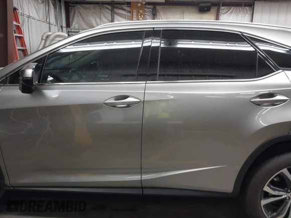 2022 Lexus RX 350 z VIN 2T2HZMDA9NC366292, wystawiony jako IAAI lot #42381449 z przebiegiem 26 717 mil mil oraz . Historia ofert i sprzedaży dostępna na DreamBid. Obrazek 14.