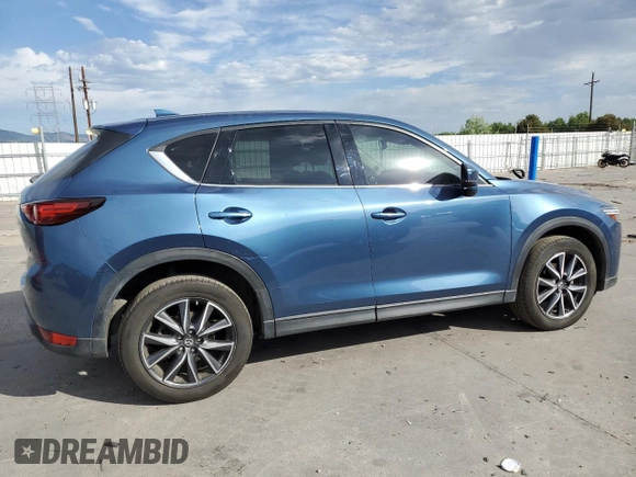 2018 Mazda CX-5 Grand Touring with VIN JM3KFBDM2J0347208, listed as a Copart auction lot 59357135 with 61,537 mi miles and Clean title. Bid and sale history available at DreamBid. Image 3.