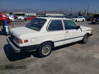 1983 BMW 3 Series z VIN WBAAG4302D8074477, wystawiony jako Copart lot #73425814 z przebiegiem 287 780 mil mil oraz Tytuł czysty. Historia ofert i sprzedaży dostępna na DreamBid. Obrazek 3.