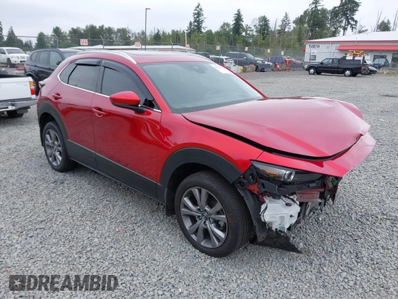 2023 Mazda CX-30 S Premium with VIN 3MVDMBDM1PM520048, listed as a IAAI auction lot 42468172 with 7,277 mi miles and . Bid and sale history available at DreamBid. Image 1.