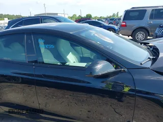 2022 Tesla Model S Plaid with VIN 5YJSA1E63NF478351, listed as a IAAI auction lot 42056199 with Not provided miles and . Bid and sale history available at DreamBid. Image 12.