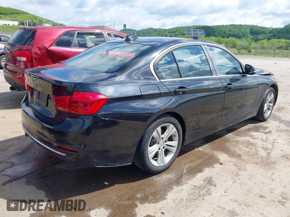2017 BMW 3 Series 330i xDrive with VIN WBA8D9C32HA011814, listed as a IAAI auction lot 42254352 with 104,547 mi miles and . Bid and sale history available at DreamBid. Image 4.