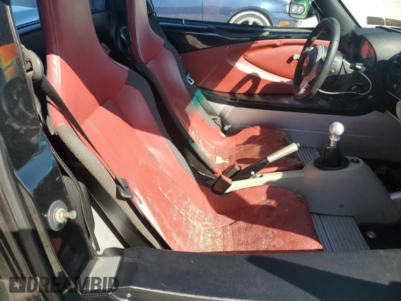2006 Lotus Elise z VIN SCCPC11196HL30330, wystawiony jako Copart lot #77806924 z przebiegiem Nie podano mil oraz Szkody całkowita. Historia ofert i sprzedaży dostępna na DreamBid. Obrazek 10.