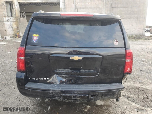 2020 Chevrolet Suburban LT with VIN 1GNSCHKC0LR301395, listed as a Copart auction lot 81477564 with 136,003 mi miles and Salvage Title. Bid and sale history available at carsss.com. Image 6.