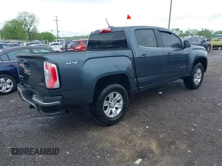 2015 GMC Canyon 4WD SLE with VIN 1GTG6BE3XF1153421, listed as a IAAI auction lot 42079375 with 161,379 mi miles and . Bid and sale history available at carsss.com. Image 4.