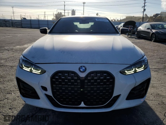 2021 BMW 4 Series 430i with VIN WBA53AP05MCG20694, listed as a Copart auction lot 85228344 with 25,979 mi miles and Salvage Title. Bid and sale history available at DreamBid. Image 5.