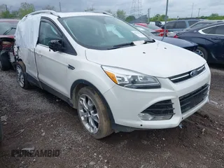 2016 Ford Escape Titanium with VIN 1FMCU9J94GUC22994, listed as a IAAI auction lot 42010816 with 80,293 mi miles. Bid and sale history available at carsss.com. Image 1.
