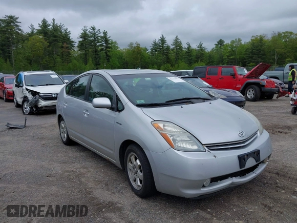 2006 Toyota Prius z VIN JTDKB20U967074471, wystawiony jako IAAI lot #42332013 z przebiegiem 303 162 mil mil oraz . Historia ofert i sprzedaży dostępna na DreamBid. Obrazek 1.