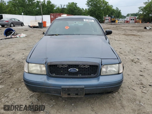 2009 Ford Police Interceptor с VIN 2FAHP71V39X111972, выставлен на аукционе Copart как лот 59130445 с пробегом 188 179 миль миль и Списание • Salvage title. История ставок и продаж доступна на DreamBid. Изображение 5.