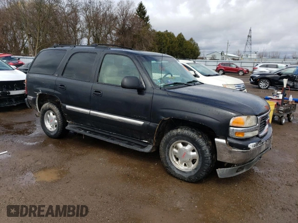 2002 GMC Yukon SLT z VIN 1GKEK13Z52R197329, wystawiony jako Copart lot #53345605 z przebiegiem 307 578 mil mil oraz Czysty tytuł • Clean title. Historia ofert i sprzedaży dostępna na DreamBid. Obrazek 4.
