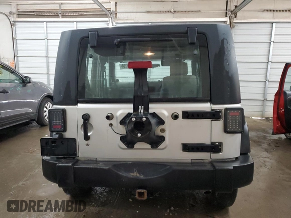 2008 Jeep Wrangler X с VIN 1J4FZ24138L526514, выставлен на аукционе Copart как лот 72569194 с пробегом 216 928 миль миль и Списание • Salvage title. История ставок и продаж доступна на DreamBid. Изображение 6.