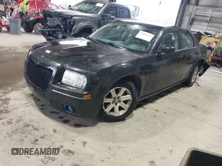 2007 Chrysler 300 Touring with VIN 2C3LA53G17H627980, listed as a IAAI auction lot 42006910 with 155,263 mi miles. Bid and sale history available at carsss.com. Image 2.