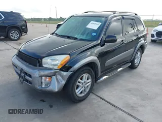 2001 Toyota RAV4 with VIN JTEGH20V910029962, listed as a IAAI auction lot 42092441 with 148,966 mi miles and . Bid and sale history available at DreamBid. Image 2.