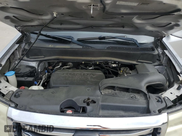 2015 Honda Pilot EX-L z VIN 5FNYF3H56FB005653, wystawiony jako Copart lot #51782155 z przebiegiem 156 247 mil mil oraz Szkoda całkowita • Salvage title. Historia ofert i sprzedaży dostępna na DreamBid. Obrazek 12.