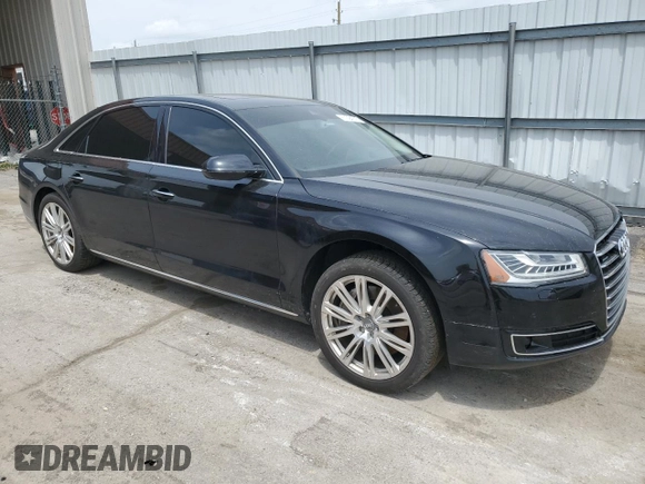2015 Audi A8 4.0T z VIN WAU32AFD8FN001493, wystawiony jako Copart lot #57394315 z przebiegiem 120 464 mil mil oraz Szkoda całkowita • Salvage title. Historia ofert i sprzedaży dostępna na DreamBid. Obrazek 4.