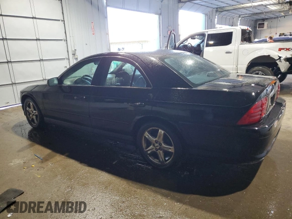 2002 Lincoln LS w/Base Pkg with VIN 1LNHM87A52Y714212, listed as a Copart auction lot 84810774 with 68,413 mi miles and Salvage Title. Bid and sale history available at DreamBid. Image 2.