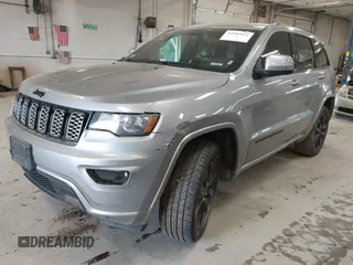 2018 Jeep Grand Cherokee Laredo E with VIN 1C4RJFAG7JC203793, listed as a IAAI auction lot 42585072 with 263,987 mi miles and . Bid and sale history available at DreamBid. Image 17.