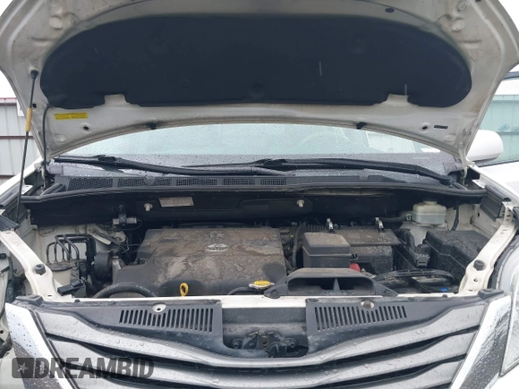2012 Toyota Sienna XLE AAS z VIN 5TDYK3DC3CS215411, wystawiony jako IAAI lot #42333328 z przebiegiem 123 677 mil mil oraz . Historia ofert i sprzedaży dostępna na DreamBid. Obrazek 10.