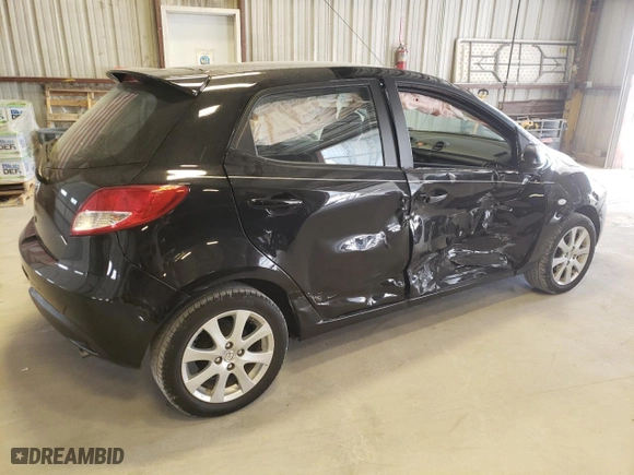 2012 Mazda Mazda2 Touring with VIN JM1DE1LY0C0147434, listed as a Copart auction lot 70712464 with 72,246 mi miles and Salvage Title. Bid and sale history available at carsss.com. Image 3.