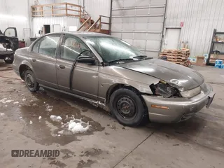 1998 Saturn SL z VIN 1G8ZH528XWZ240574, wystawiony jako IAAI lot #41588681 z przebiegiem Nie podano mil oraz . Historia ofert i sprzedaży dostępna na DreamBid. Obrazek 1.