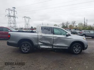 2020 Honda Ridgeline RTL-E with VIN 5FPYK3F73LB004365, listed as a IAAI auction lot 41965887 with 80,981 mi miles and . Bid and sale history available at DreamBid. Image 13.