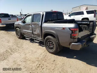 2022 Nissan Frontier PRO-X with VIN 1N6ED1EJ4NN687038, listed as a Copart auction lot 74777834 with 2,180 mi miles and Salvage Title. Bid and sale history available at carsss.com. Image 2.