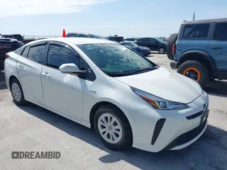2020 Toyota Prius L Eco z VIN JTDKARFU8L3126291, wystawiony jako IAAI lot #42190242 z przebiegiem 60 404 mil mil oraz . Historia ofert i sprzedaży dostępna na DreamBid. Obrazek 1.