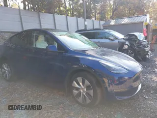 2024 Tesla Model Y Long Range with VIN 7SAYGDEE1RA266328, listed as a IAAI auction lot 40610351 with 13,573 mi miles. Bid and sale history available at carsss.com. Image 1.
