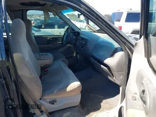 1999 Ford F-150 with VIN 1FTRX17W5XKB46900, listed as a IAAI auction lot 41792177 with Not provided miles and . Bid and sale history available at DreamBid. Image 5.