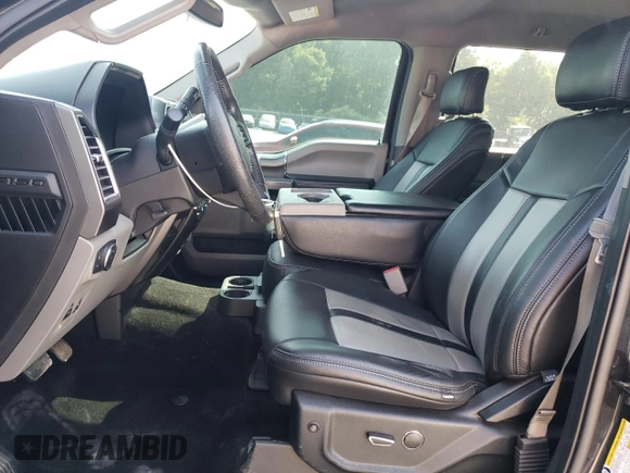 2015 Ford F-150 XLT with VIN 1FTEW1EP0FKF00544, listed as a Copart auction lot 62571615 with 233,318 mi miles and Salvage title. Bid and sale history available at DreamBid. Image 7.