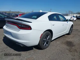 2023 Dodge Charger SXT z VIN 2C3CDXJG9PH636755, wystawiony jako IAAI lot #41996030 z przebiegiem 16 827 mil mil oraz . Historia ofert i sprzedaży dostępna na DreamBid. Obrazek 4.