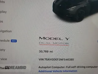 2022 Tesla Model Y Performance with VIN 7SAYGDEF3NF546385, listed as a Copart auction lot 83784984 with 30,769 mi miles and Salvage Title. Bid and sale history available at DreamBid. Image 9.