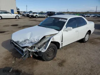 1992 Toyota Camry LE with VIN 4T1SK12E0NU064956, listed as a Copart auction lot 50665925 with 228,909 mi miles and Salvage Title. Bid and sale history available at carsss.com. Image 1.